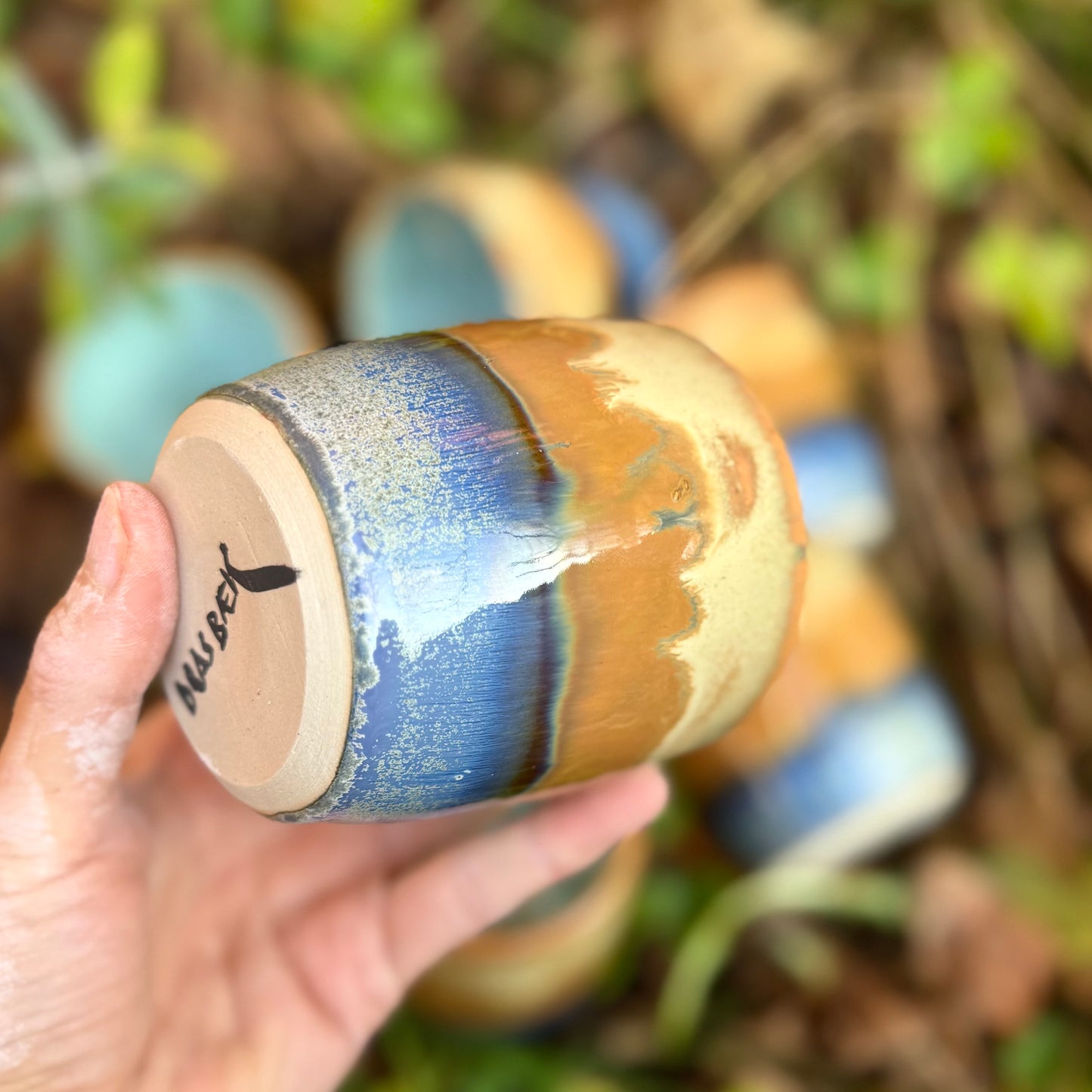 Krus med lyseblå midte.