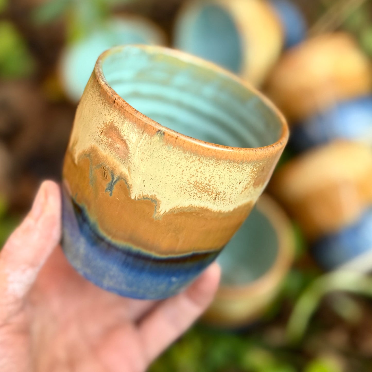 Krus med lyseblå midte.