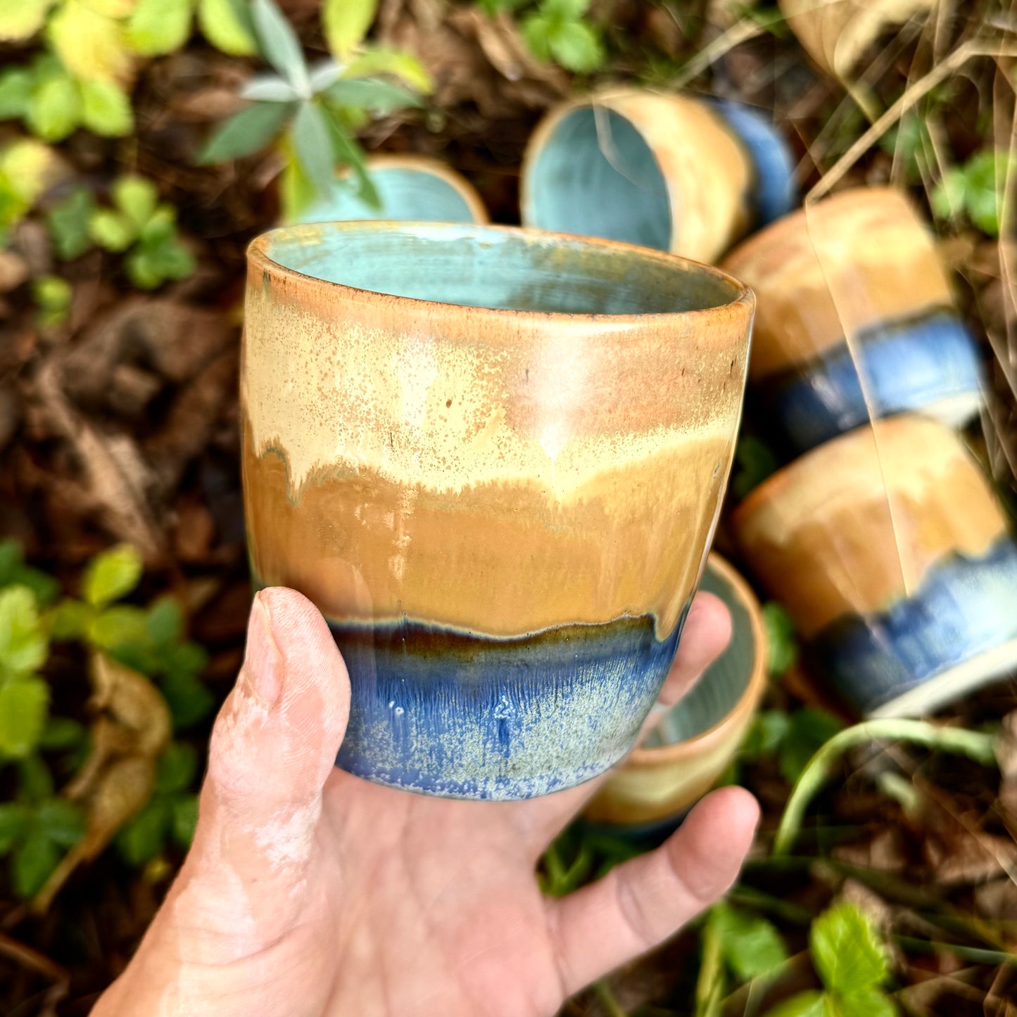 Krus med lyseblå midte.